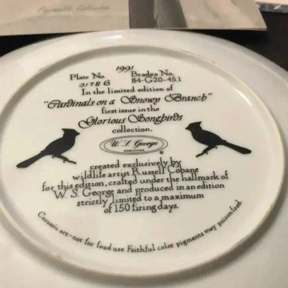 Cardinals on‎ a snowy branch collector plate
